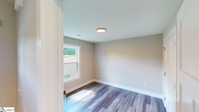 1306 Fairview Rd, Gaffney, SC 29341 - unfurnished bedroom with wood finished floors and baseboards