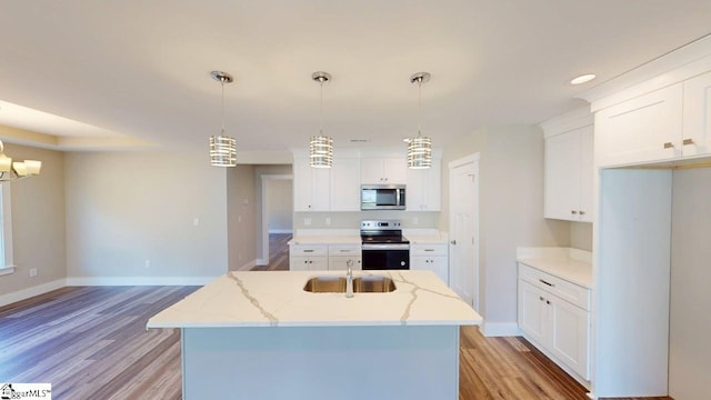 1306 Fairview Rd, Gaffney, SC 29341 - kitchen featuring stainless steel appliances, a sink, light wood finished floors, and baseboards