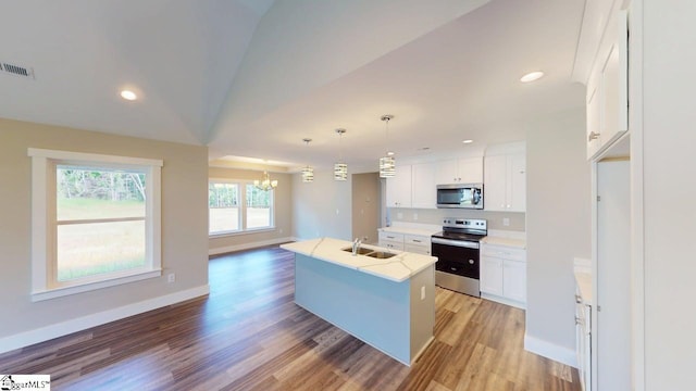 1306 Fairview Rd, Gaffney, SC 29341 - kitchen featuring stainless steel appliances, light wood-style floors, a chandelier, white cabinets, and a sink
