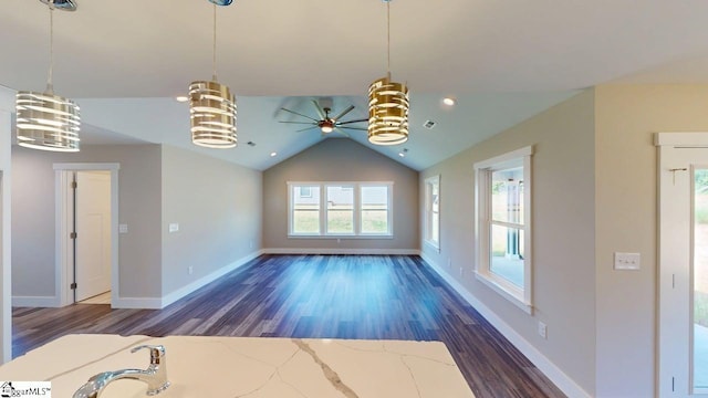 1306 Fairview Rd, Gaffney, SC 29341 - unfurnished living room featuring a chandelier, a ceiling fan, dark wood-style floors, baseboards, and lofted ceiling