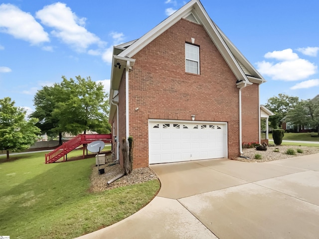 view of side of property featuring a garage, concrete driveway, a lawn, and brick siding