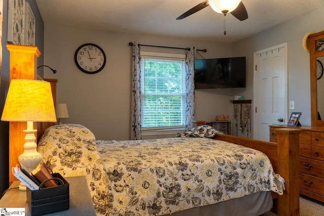 bedroom featuring ceiling fan