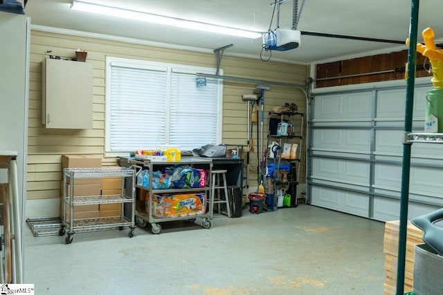 garage featuring a garage door opener