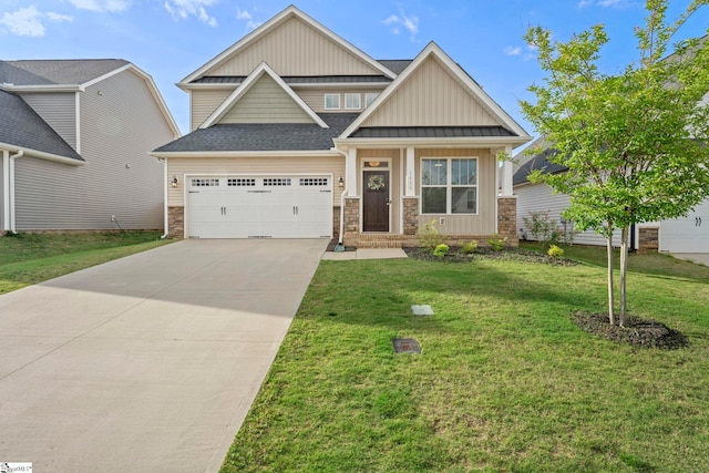 craftsman inspired home featuring board and batten siding, a garage, a front lawn, driveway, and stone siding