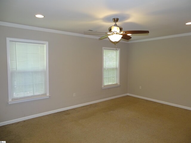carpeted empty room featuring crown molding, ceiling fan, baseboards, and recessed lighting