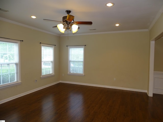 unfurnished room with dark wood-style flooring, healthy amount of natural light, a ceiling fan, crown molding, and recessed lighting