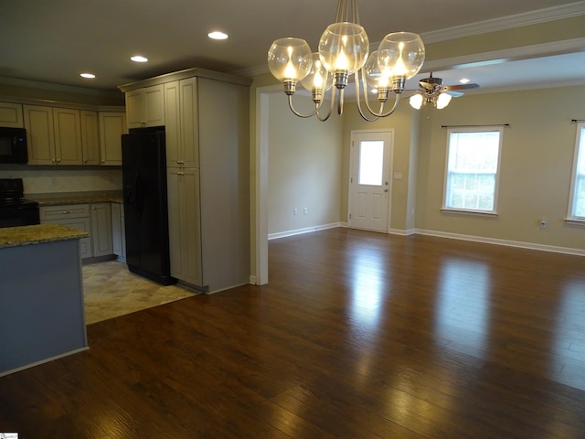 kitchen with black appliances, crown molding, a chandelier, wood finished floors, and baseboards