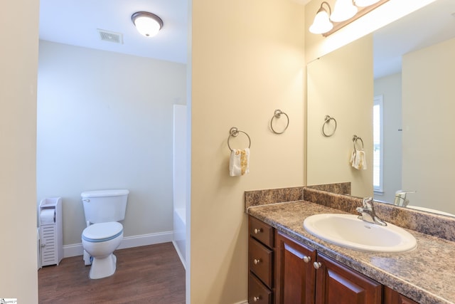 204 Silver Run Ln, Greenville, SC 29607 - bathroom with toilet, vanity, wood finished floors, and baseboards