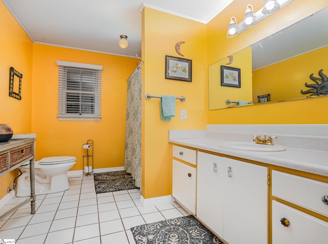 1312 Anderson Hwy, Easley, SC 29642 - bathroom featuring toilet, tile patterned floors, vanity, ornamental molding, and baseboards