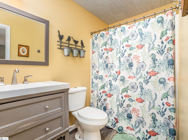 1312 Anderson Hwy, Easley, SC 29642 - full bath featuring wood finished floors, vanity, toilet, and curtained shower