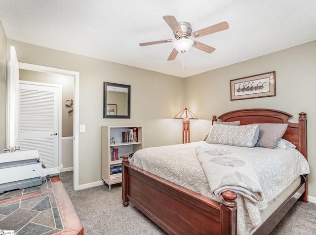 1312 Anderson Hwy, Easley, SC 29642 - carpeted bedroom featuring baseboards and ceiling fan