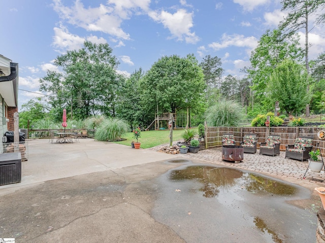 1312 Anderson Hwy, Easley, SC 29642 - view of home's community with a patio, a playground, an outdoor living space, and outdoor dining space