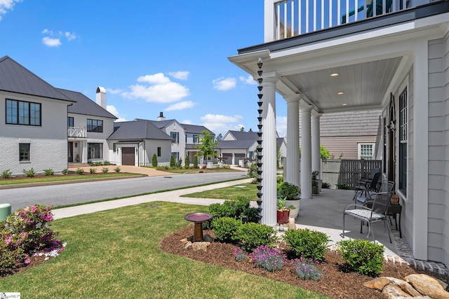 114 Burrough St, Greenville, SC 29615 - view of grassy yard featuring a residential view, covered porch, and a balcony