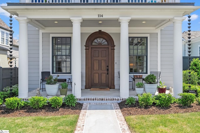 114 Burrough St, Greenville, SC 29615 - view of exterior entry featuring covered porch and fence
