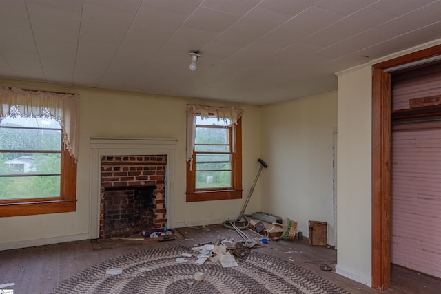 156 Spencer Rd, Jonesville, SC 29653 - unfurnished living room featuring a brick fireplace