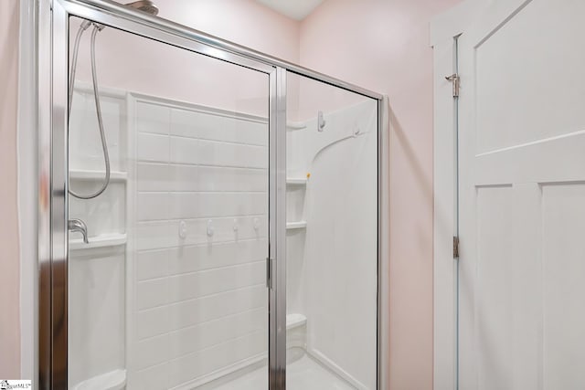 full bathroom featuring a stall shower