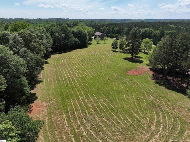overview of rural landscape featuring a heavily wooded area