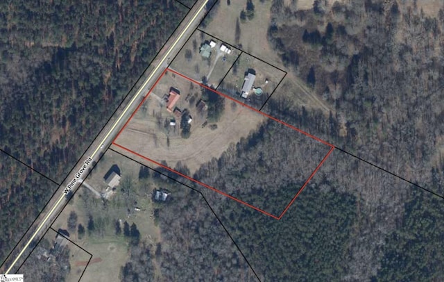 aerial overview of property's location with property parcel outlined