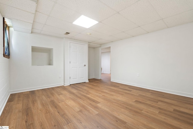 205 Woodfield Dr, Piedmont, SC 29673 - finished basement featuring light wood finished floors, a paneled ceiling, and baseboards