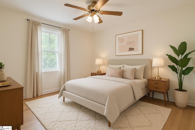 205 Woodfield Dr, Piedmont, SC 29673 - bedroom with light wood finished floors, baseboards, and ceiling fan