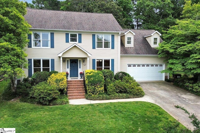 111 Golf View Ln, Greenville, SC 29609 - colonial-style house featuring concrete driveway, a front lawn, a garage, and a shingled roof
