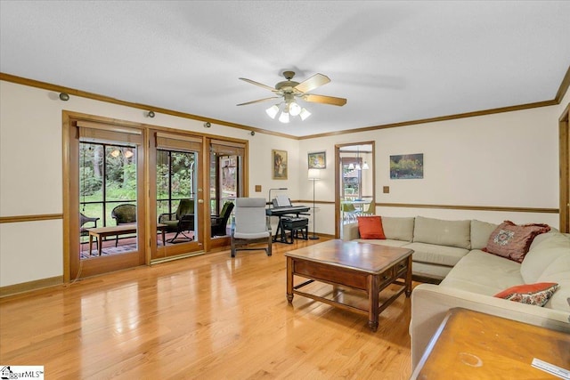 111 Golf View Ln, Greenville, SC 29609 - living room featuring light wood-style flooring, ceiling fan, crown molding, and baseboards