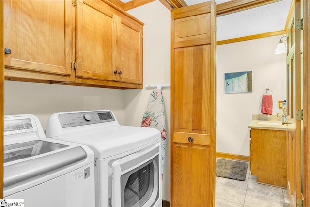 111 Golf View Ln, Greenville, SC 29609 - clothes washing area with washer and clothes dryer, cabinet space, and light tile patterned flooring