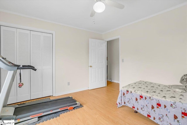 111 Golf View Ln, Greenville, SC 29609 - bedroom featuring light wood-style floors, crown molding, baseboards, a closet, and a ceiling fan