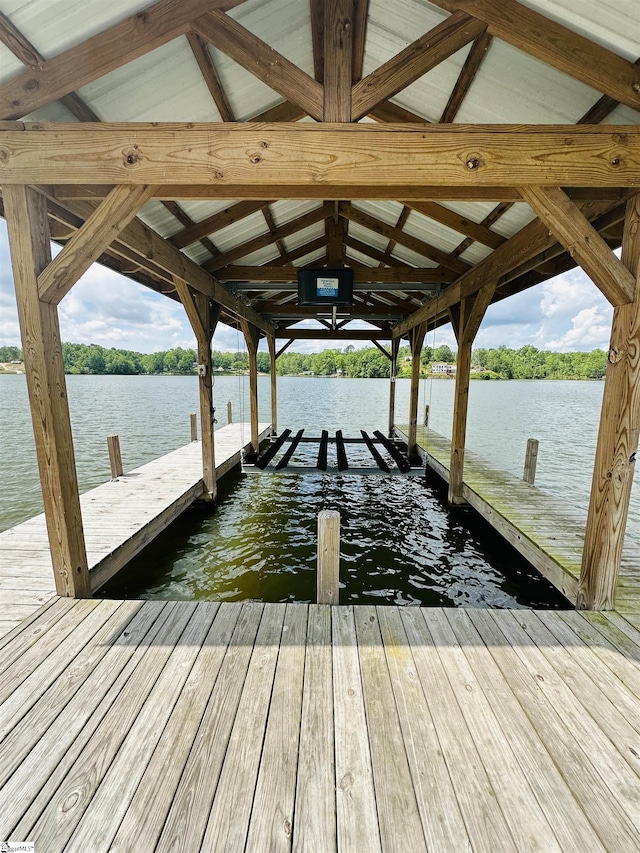 dock featuring a water view and boat lift