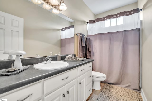 full bath with vanity, toilet, a shower with curtain, and tile patterned flooring