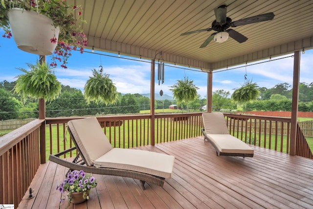 wooden deck with ceiling fan