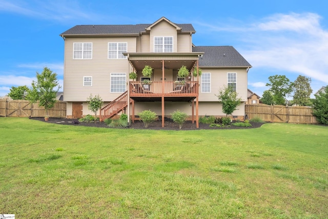 back of property with a deck and stairway