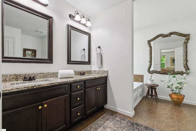 31 Goodwin Farms Ct, Travelers Rest, SC 29690 - bathroom featuring double vanity, a garden tub, baseboards, and tile patterned flooring