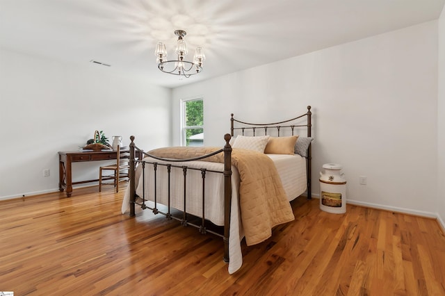 31 Goodwin Farms Ct, Travelers Rest, SC 29690 - bedroom featuring a chandelier, light wood finished floors, and baseboards