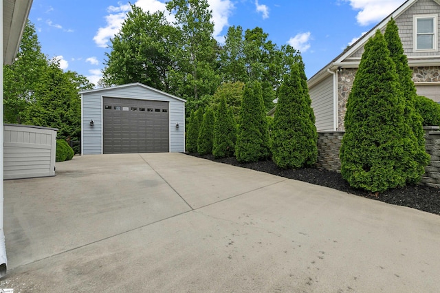 31 Goodwin Farms Ct, Travelers Rest, SC 29690 - view of side of property featuring an outbuilding, a detached garage, and stone siding