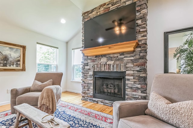 31 Goodwin Farms Ct, Travelers Rest, SC 29690 - living area with lofted ceiling, wood finished floors, a fireplace, and baseboards