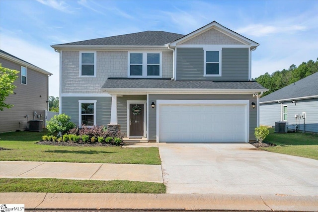 204 Hazelcroft Dr, Fountain Inn, SC 29644 - view of front of house featuring concrete driveway, central AC unit, an attached garage, and a front yard