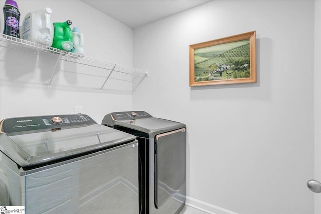 204 Hazelcroft Dr, Fountain Inn, SC 29644 - washroom with independent washer and dryer and baseboards