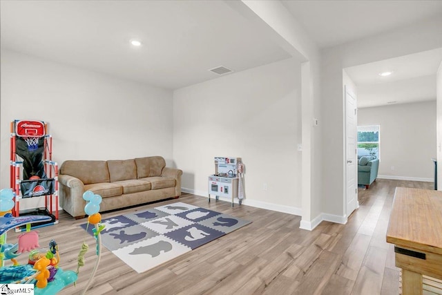 204 Hazelcroft Dr, Fountain Inn, SC 29644 - living room featuring wood finished floors, recessed lighting, and baseboards