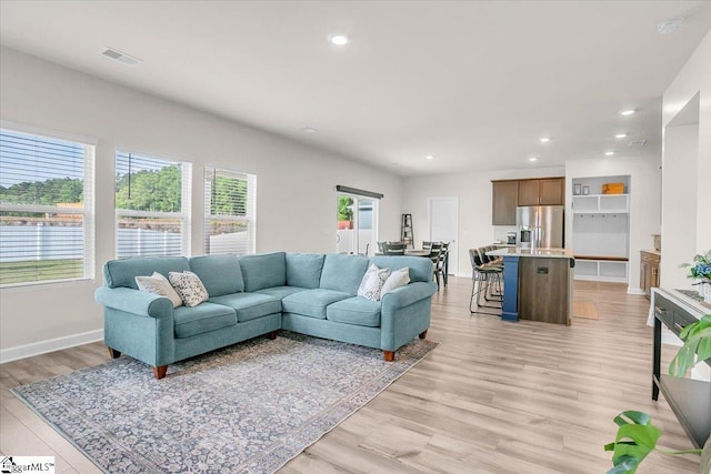 204 Hazelcroft Dr, Fountain Inn, SC 29644 - living room with light wood finished floors, recessed lighting, and baseboards