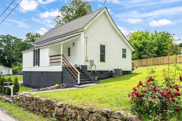 11 Adger St, Pelzer, SC 29669 - view of front facade with central AC unit, roof with shingles, and crawl space