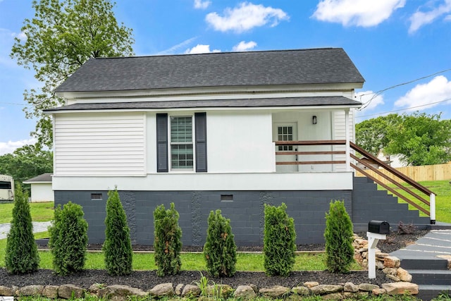 11 Adger St, Pelzer, SC 29669 - view of front facade with roof with shingles, fence, and stairs