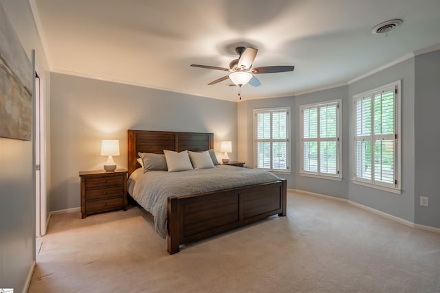 bedroom featuring ornamental molding, light carpet, baseboards, and ceiling fan