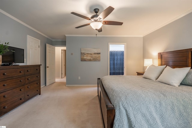 bedroom with light colored carpet, ornamental molding, baseboards, and ceiling fan
