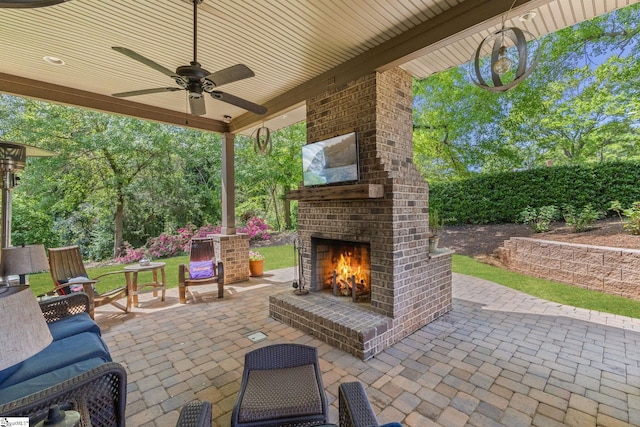 15 Paddington Ave, Greenville, SC 29609 - view of patio with an outdoor brick fireplace and ceiling fan