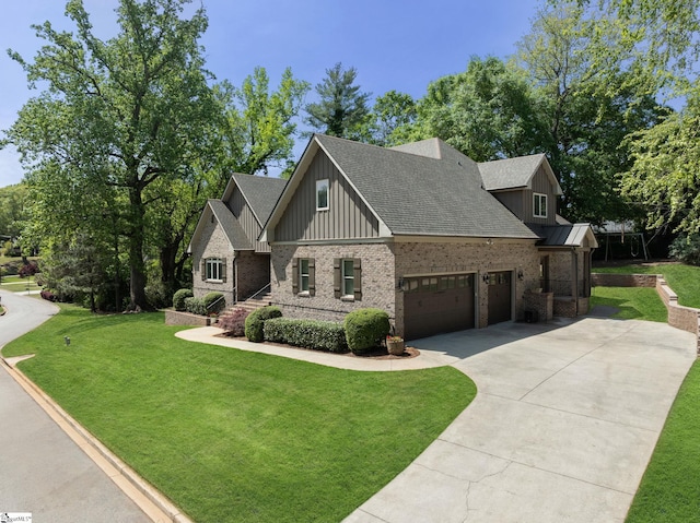15 Paddington Ave, Greenville, SC 29609 - craftsman-style house with board and batten siding, brick siding, a garage, and a front lawn
