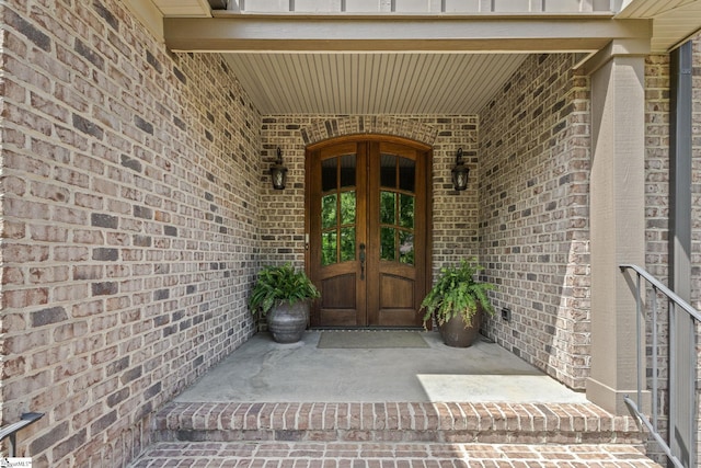 15 Paddington Ave, Greenville, SC 29609 - property entrance with french doors and brick siding
