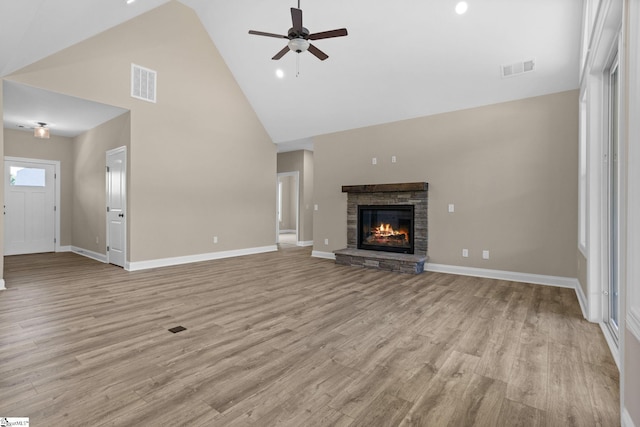 21 Old American Blvd, Pendleton, SC 29670 - unfurnished living room with high vaulted ceiling, ceiling fan, a fireplace, baseboards, and light wood-style flooring