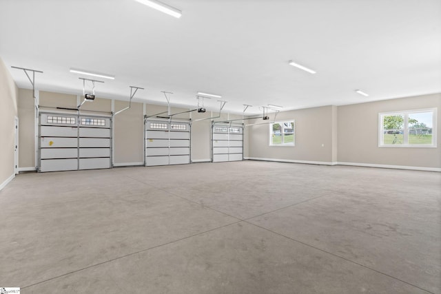 21 Old American Blvd, Pendleton, SC 29670 - garage featuring a garage door opener and baseboards