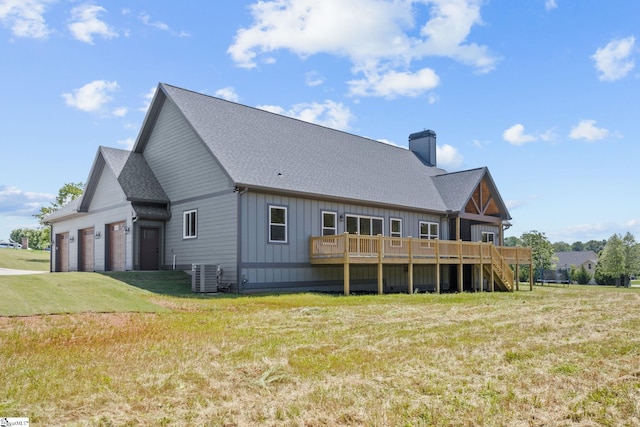 21 Old American Blvd, Pendleton, SC 29670 - rear view of house with a chimney, cooling unit, a deck, a lawn, and board and batten siding